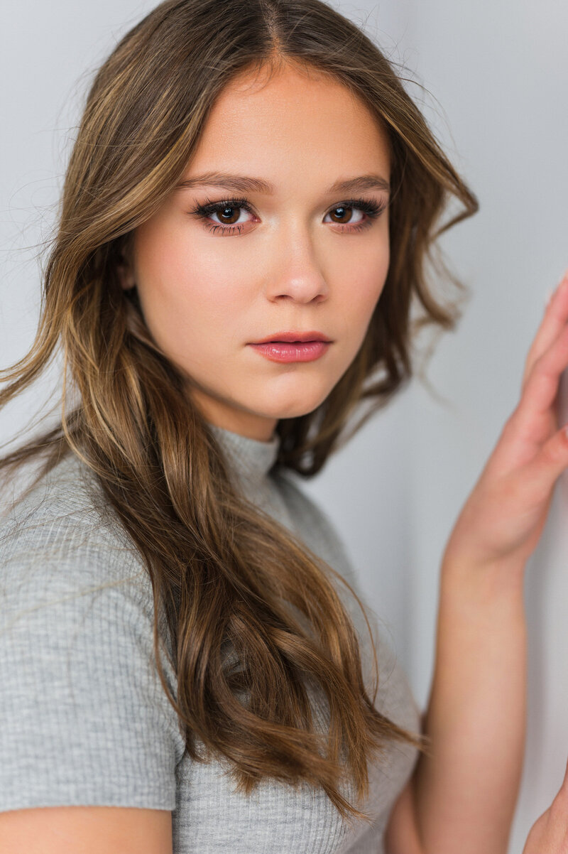 Capture your teen's personality with magazine-quality studio portraits by Leslie Q Photography. Our professional sessions deliver high-end, confidence-boosting images. Conveniently located in New Carlisle, serving South Bend, Michigan City, and surrounding areas.