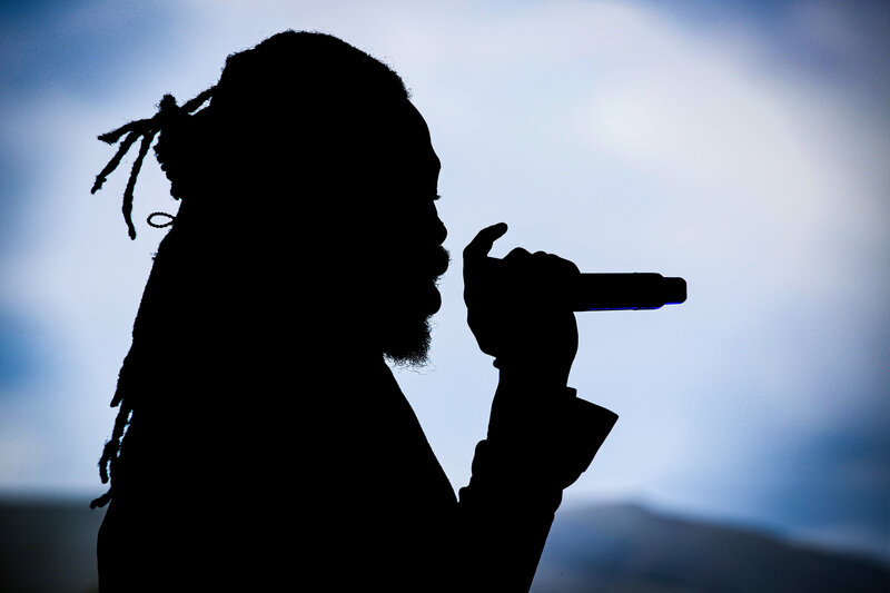 The Black Pumas perform in Highlands, North Carolina at a music festival.    Asheville photographer Light Shifter Studios captures this live concert. 