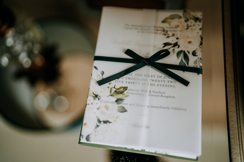 vellum wrap wedding invitation with gold foil