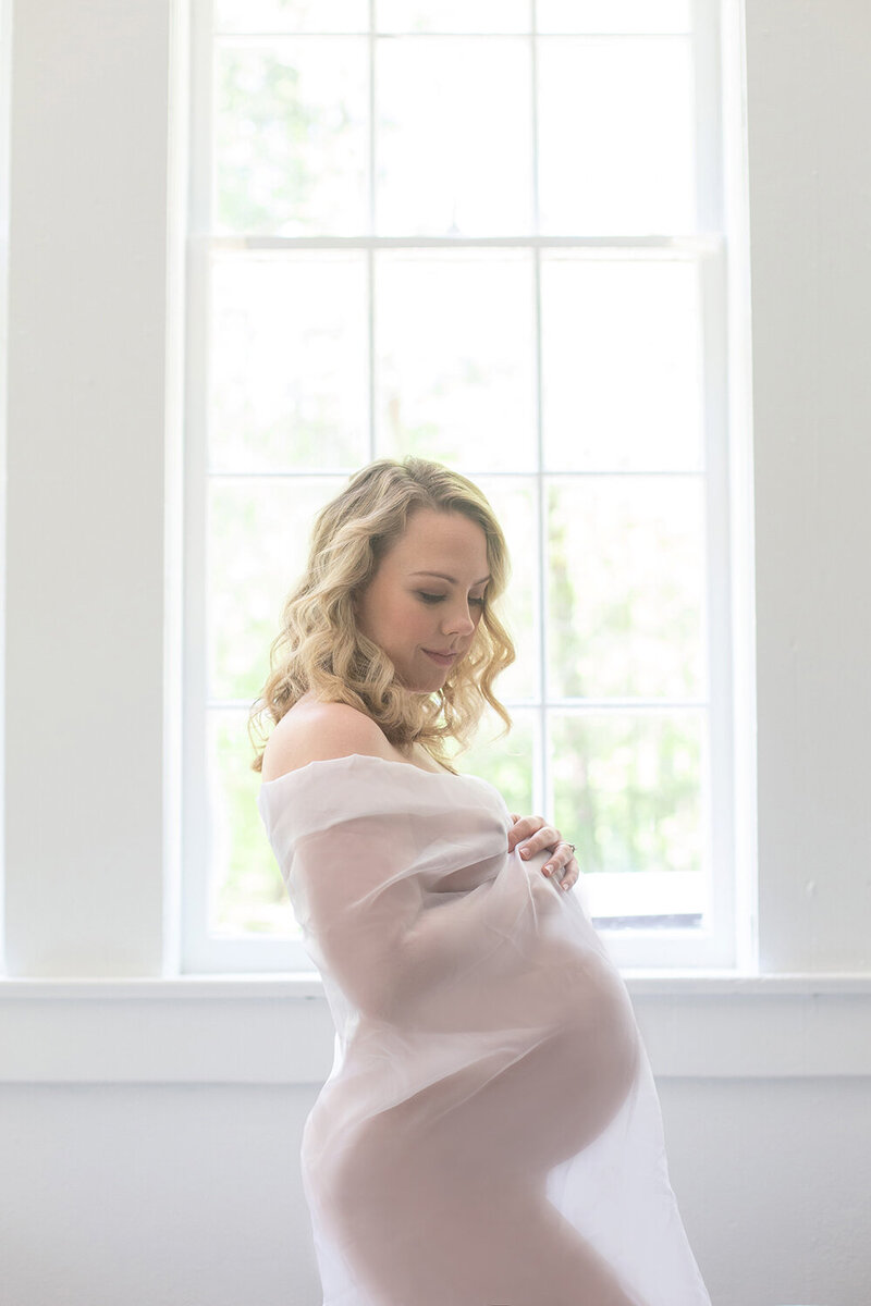 Hush Boudoir specializes in maternity portraits in our gorgeous studio in Raleigh