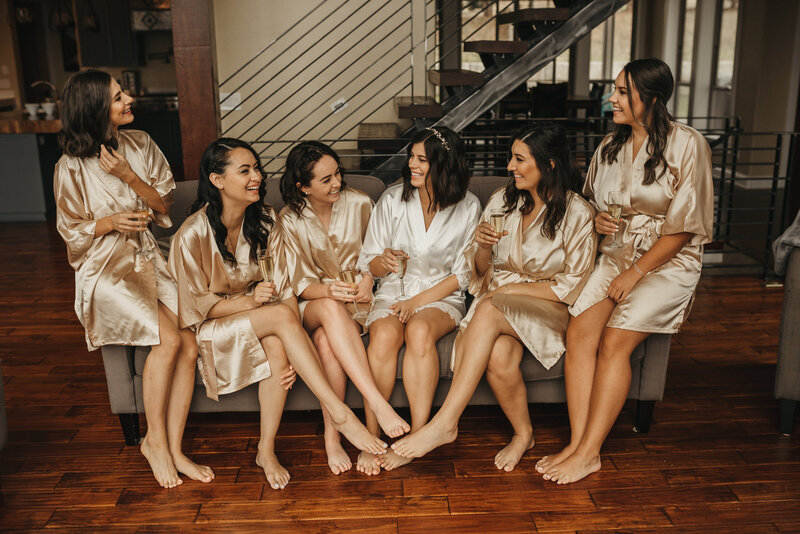 Bridesmaids getting ready in gold
