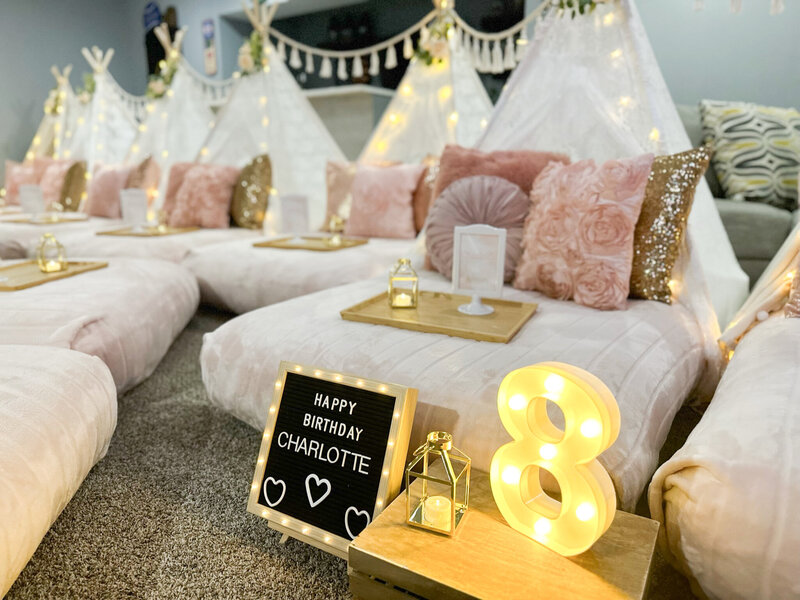 stitch themed slumber party decor with teepee beds