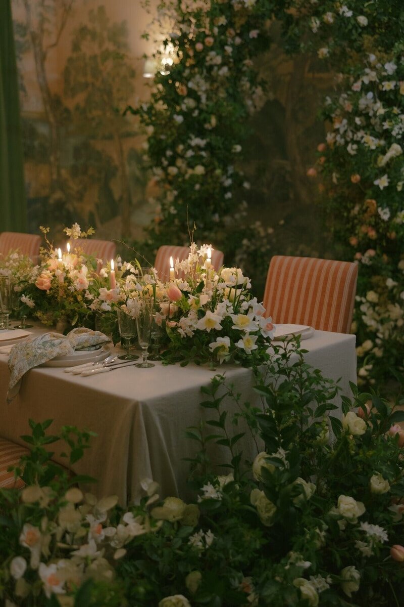 Candlelit wedding tablescape with luxury spring florals