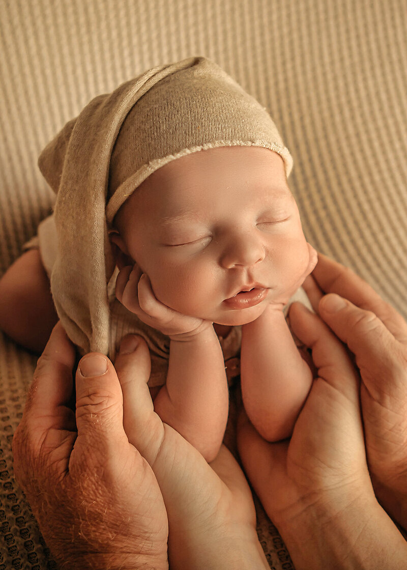 baby boy newborn session in ashley mcclintock photography studio 8