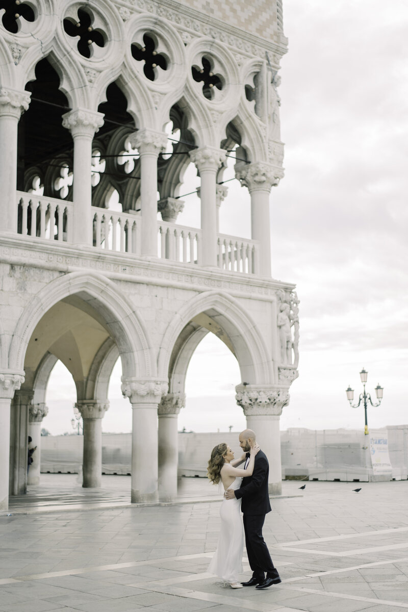 Girl with curly hair in venice with her fiance that just got engaged