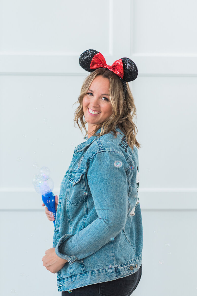 Jess Collins portrait in Mickey Mouse ears