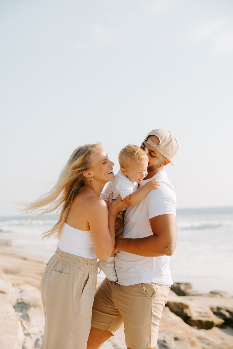 Maternity Portrait with baby shoes