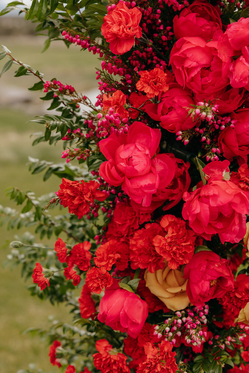 Wedding ceremony at Brasada Ranch with whimsical floral design