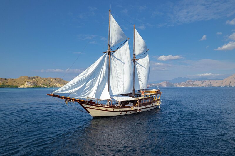 Escape to pristine white beaches and azure waters on a luxury yacht journey in Indonesia with Nataraja.