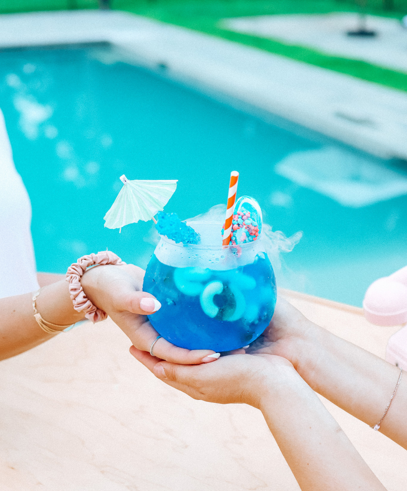 Colorful candy fishbowl from mobile bar in NJ by a poolside