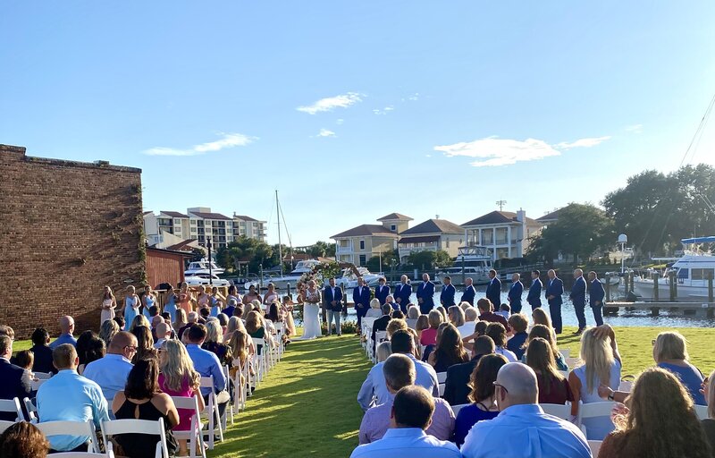 Large Gathering of Guests for Ceremony at Best Wedding Venue Palafox Wharf Waterfront Pensacola, FL