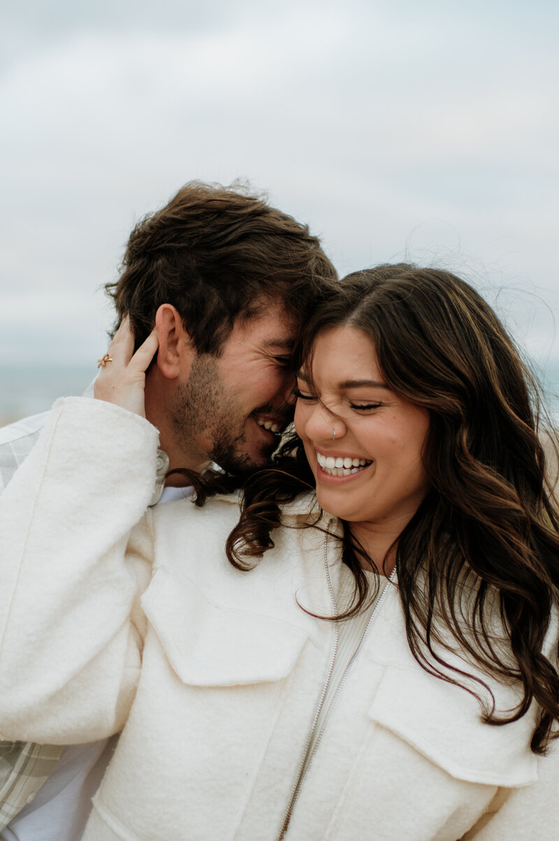 Laughing couple engagement photo Indiana