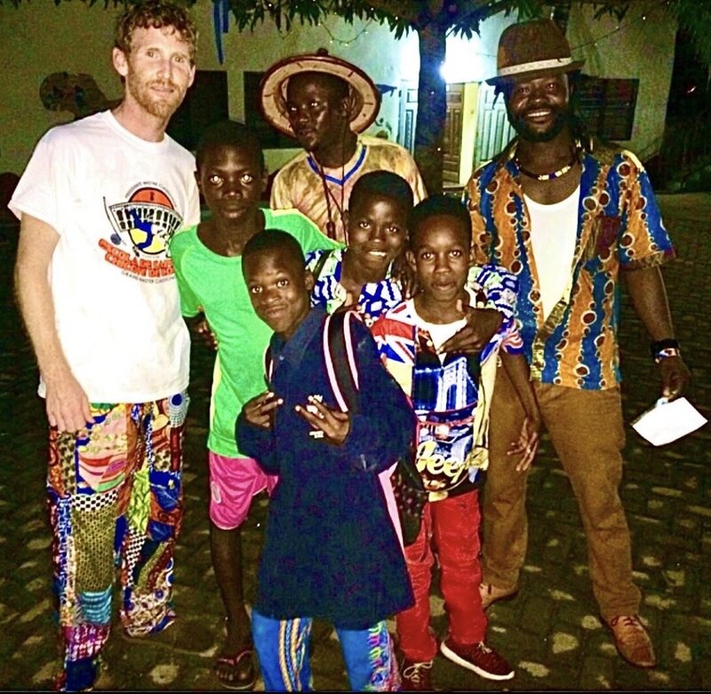 Children and adults gathered during Daniel’s travels