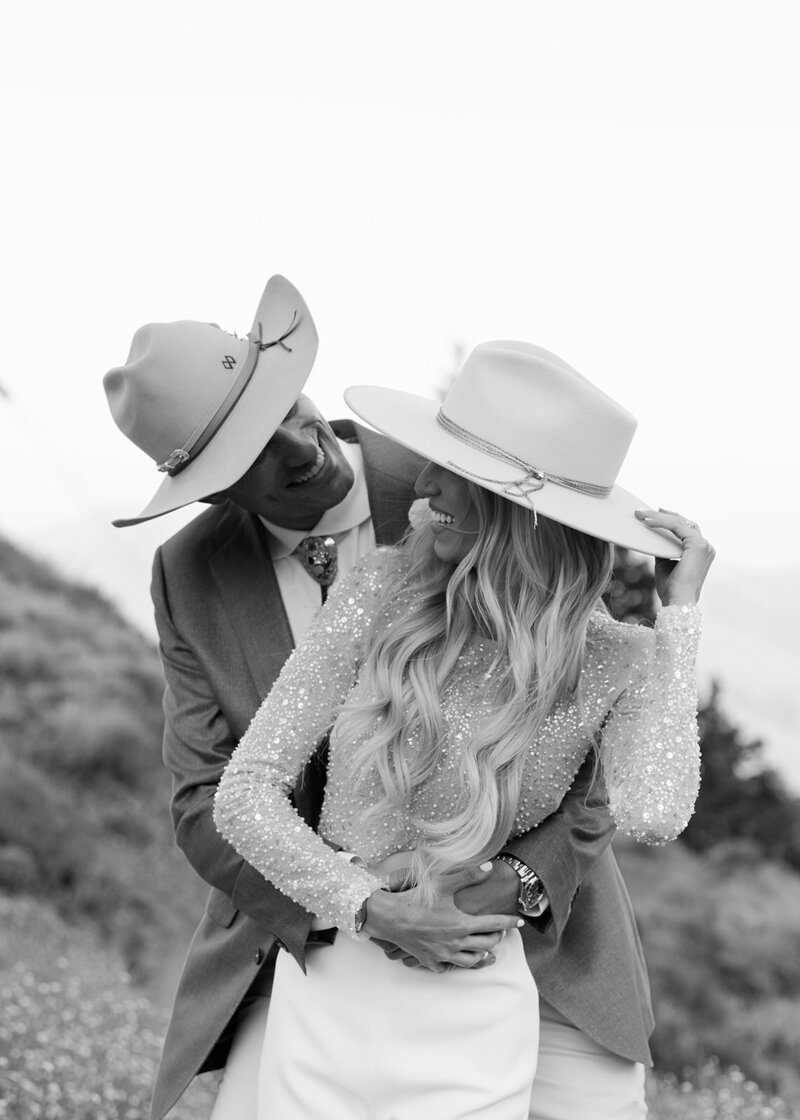 bride and groom on mountain