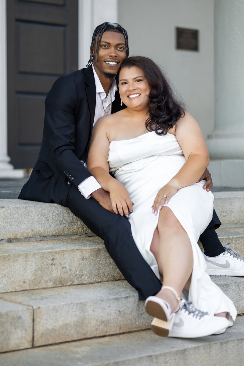 Bride and groom walk up memorial steps at their DC wedding