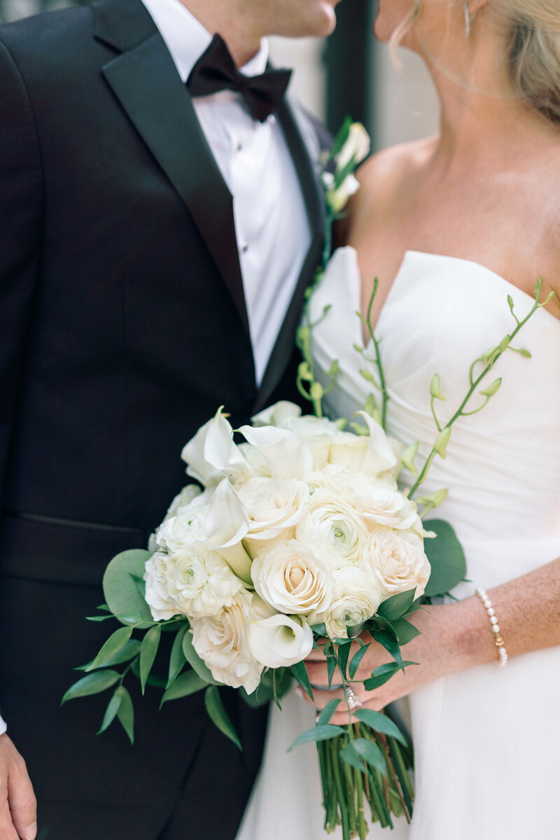 white roses graces the scene, capturing the timeless elegance of a perfect day. As a Georgia wedding photographer, I love highlighting the delicate details that make each moment unforgettable.
