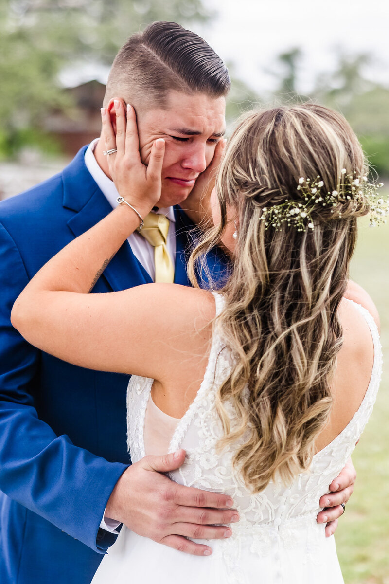 Bride and groom embrace at a wedding in Waco, Texas.