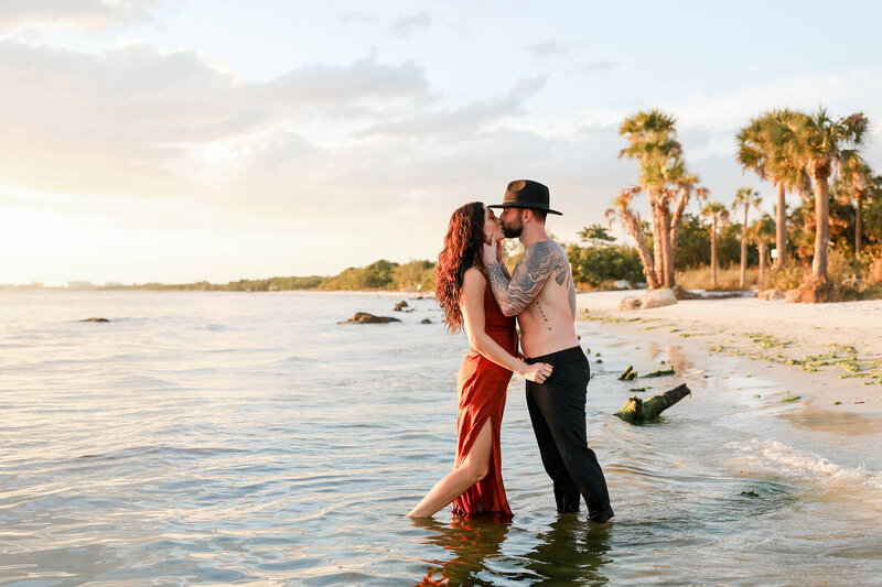 Couples sunset beach portraits for their engagement photography