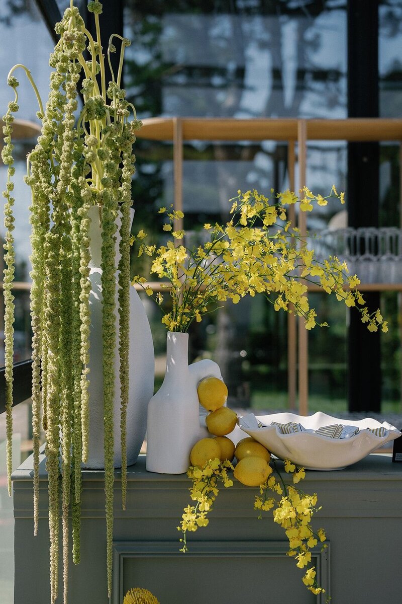 luxury floral design with fruit at outdoor New England wedding