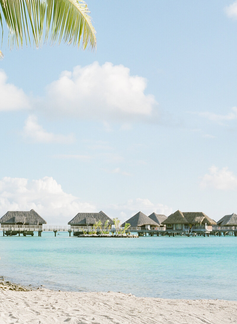 Overwater bungalows and beach at the Intercontinental Bora Bora