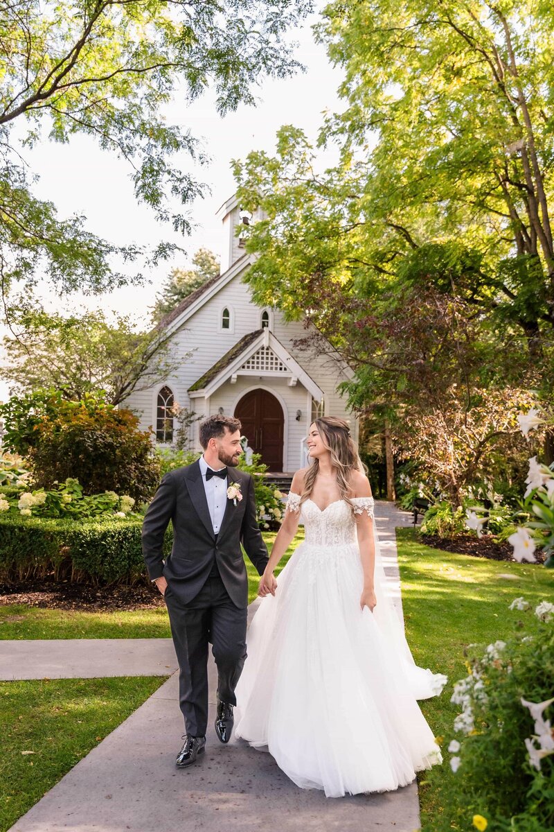Bride and groom walk up memorial steps at their DC wedding