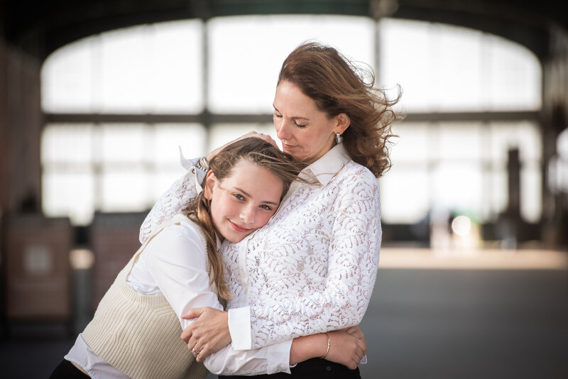 A child hugging their mother