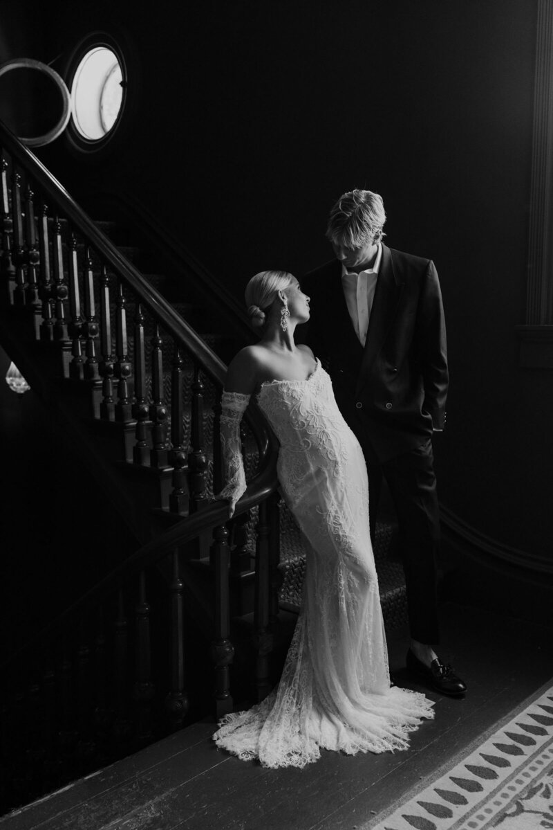 Black and white portrait of a couple in California posing for their wedding