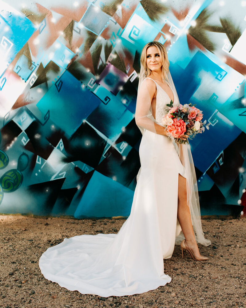Bride stands in front of a holographic wedding display