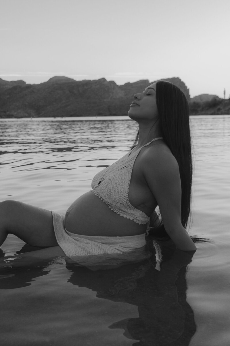 Soulful motherhood photography session by the water near Mesa, Arizona.