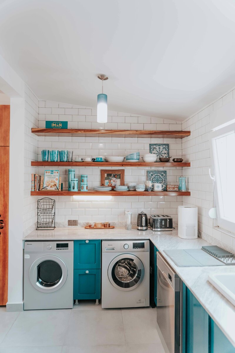 kitchen with laundry area with shelving