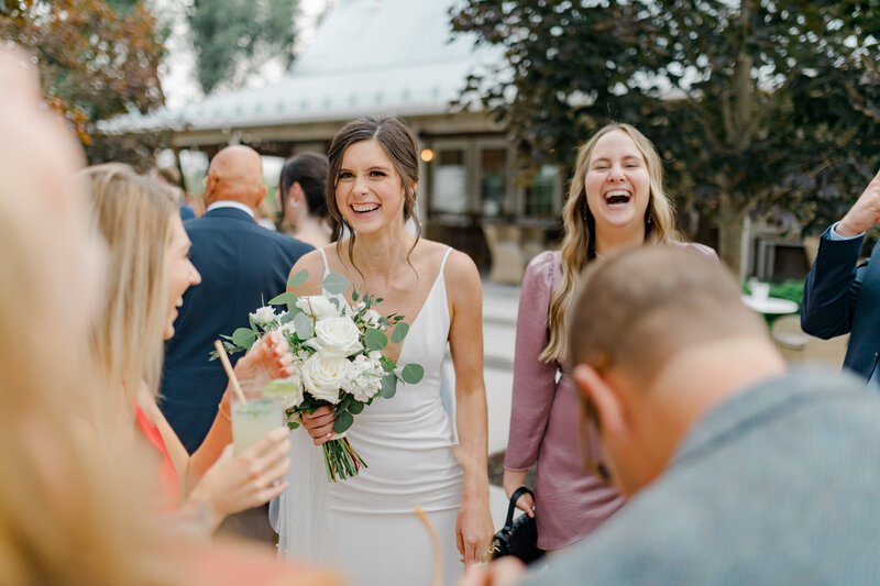 Grey Loft Studio - Bethany and Luc Barette - Wedding Photography Wedding Videography Ottawa - Ashley Graeme Side Door Restaurant Ottawa Wedding - Bridal Party Cheering On Wedding Couple