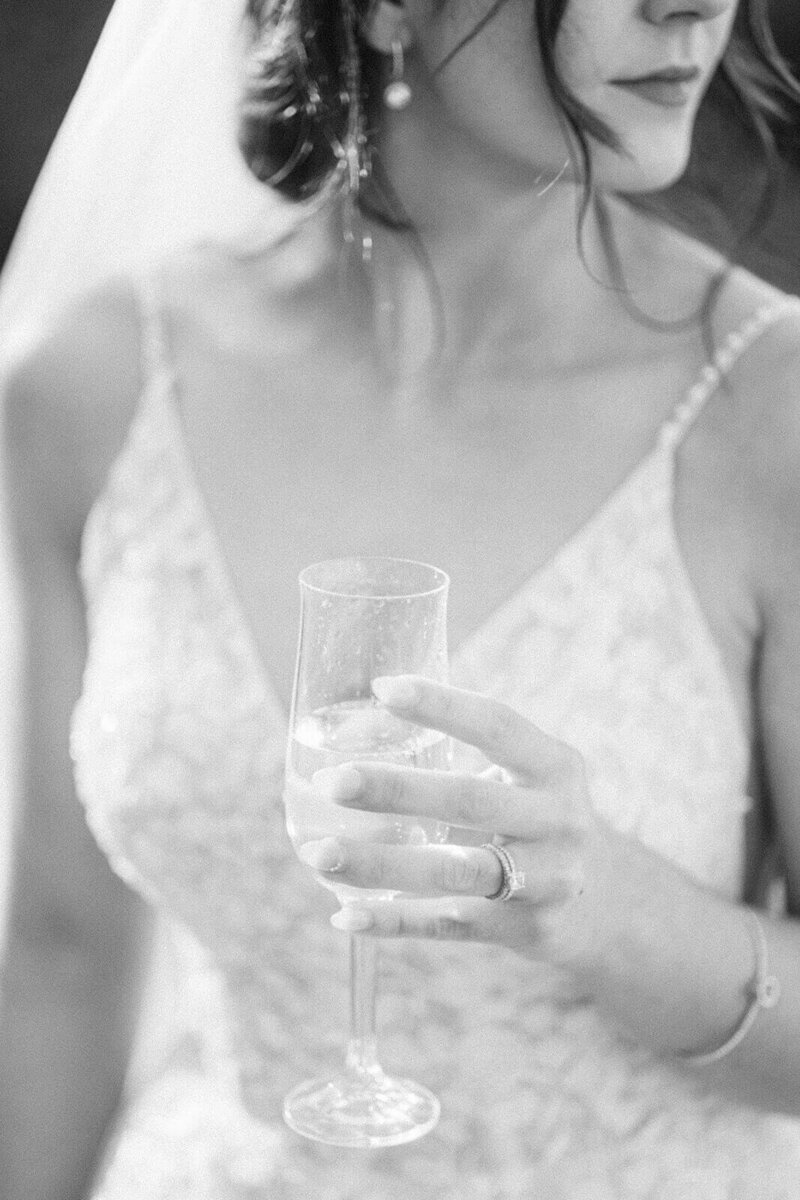 Beautiful-bride-holding-champagne