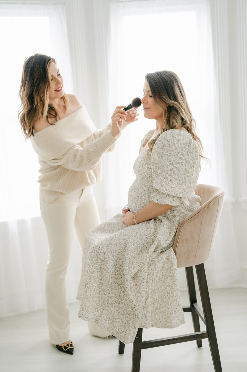 Preparing for a luxury maternity and family photoshoot.