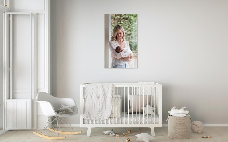 mom and baby artwork hanging above crib in kelowna nursery