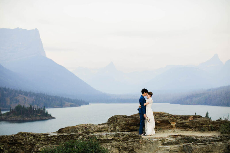 bride and groom kiss after their colorado mountaintop elopement