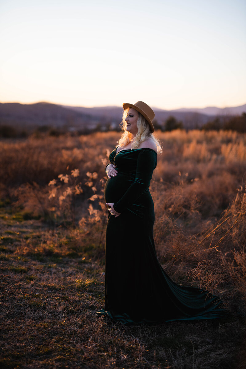 smokey mountain maternity session mom to be holding her belly