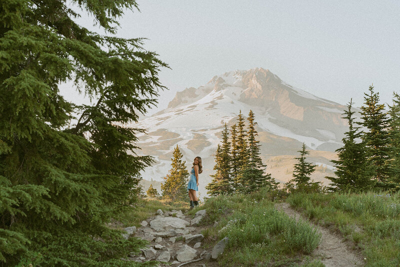 girl standing in forest in portland nature park