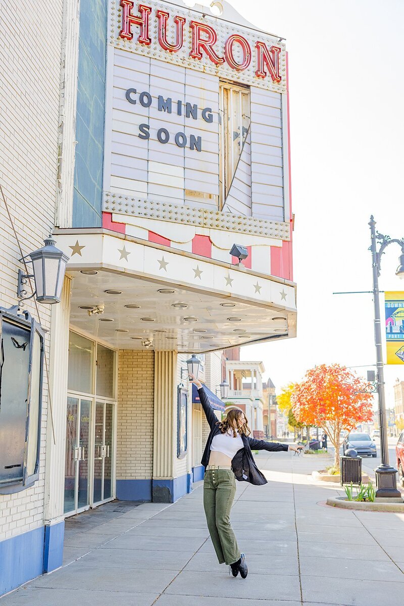 New Haven high school senior tap dancing on streets in Port Huron.