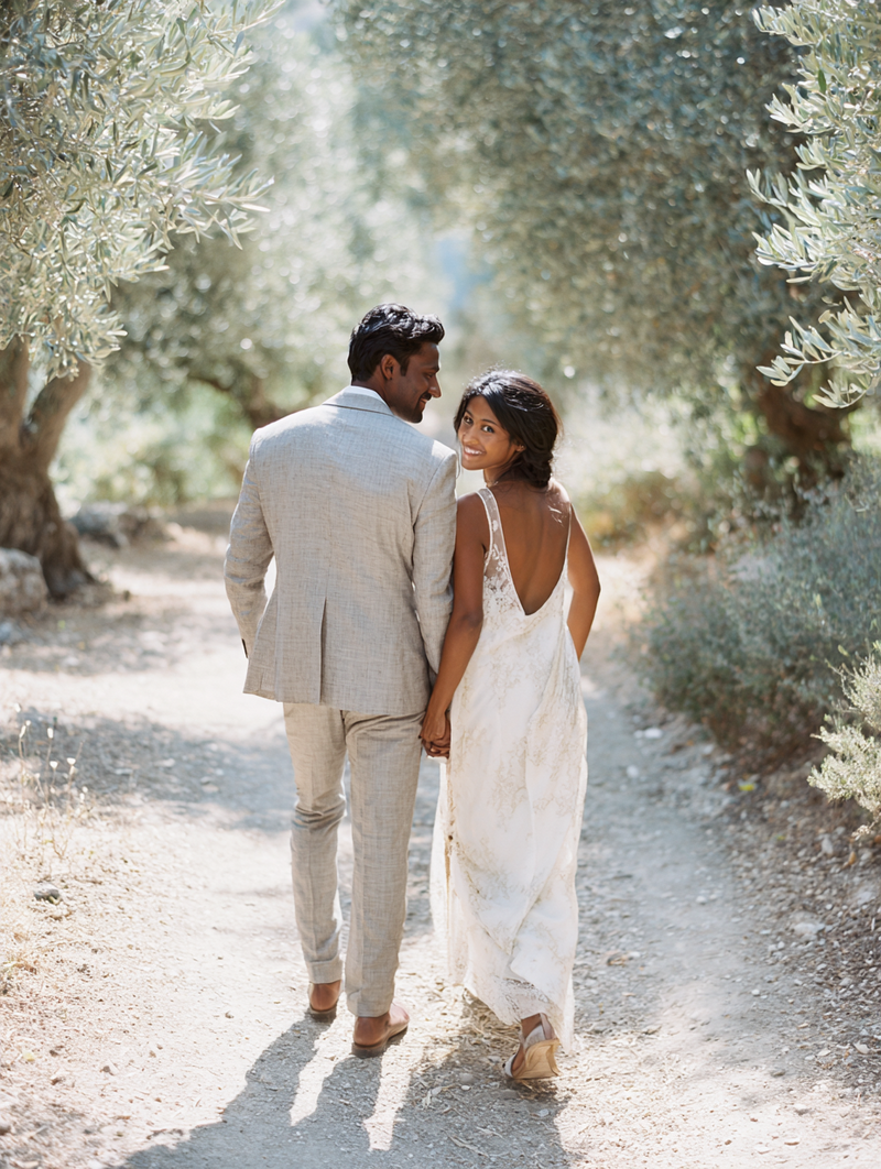 krista5123_Interracial_couple_walking_through_olive_grove_tal_efaa47f6-62c0-4655-9f95-afaca983d96f_2