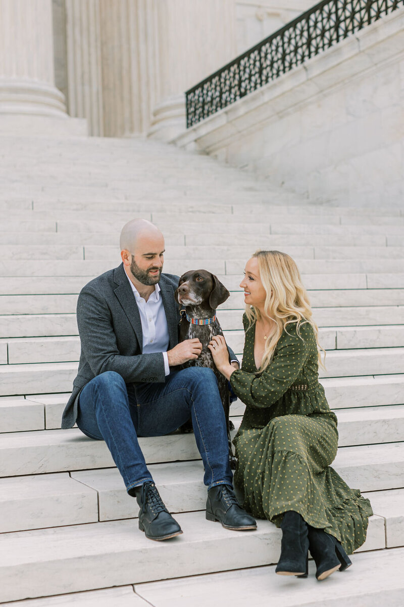 Husband, wife, dog, pose for family photos in Washington DC