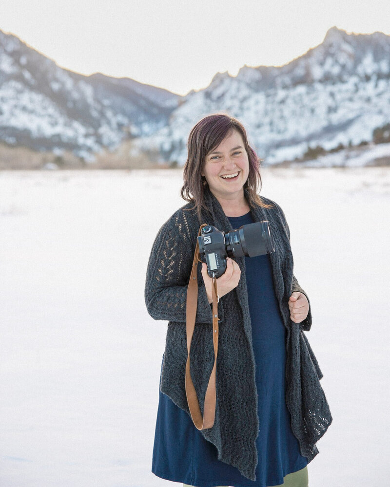 Stephanie, a boulder wedding photographer smiling at the camera near Eldorado Canyon in Boulder, Colorado