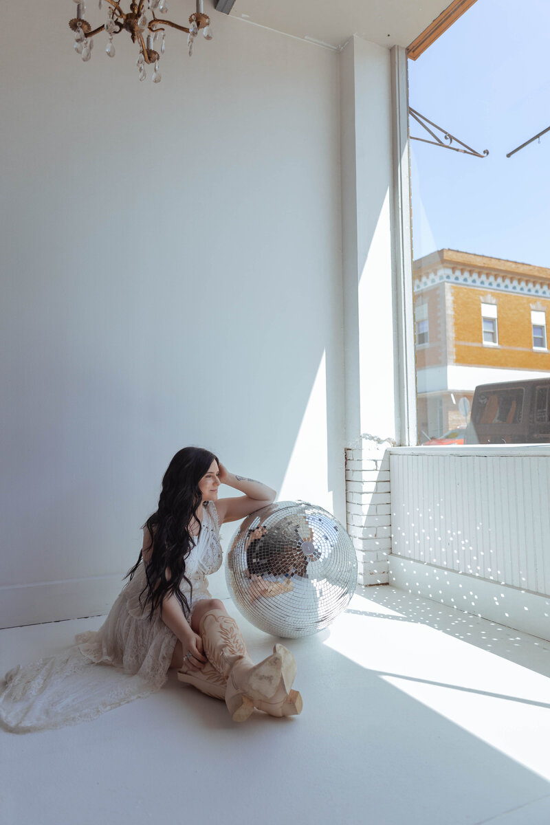 Tayler, owner of DawnTayler Studio, styling content for boutique shoot