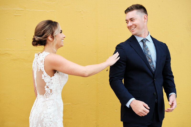 Bride turns the groom around for a first look