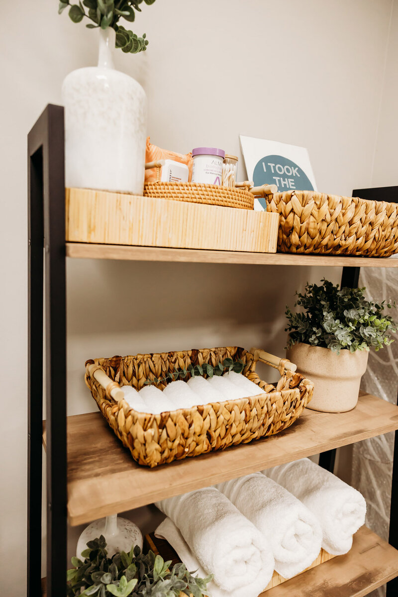 Shelf with towels and vitamins