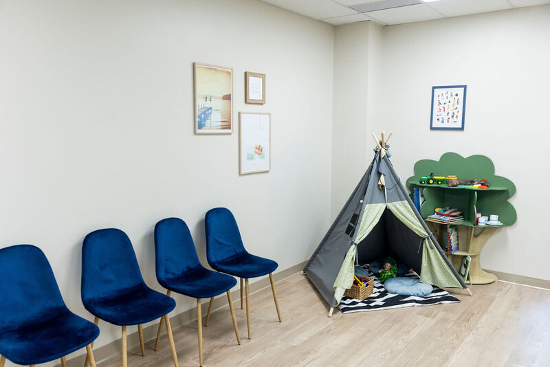 Children's and chairs in an office space