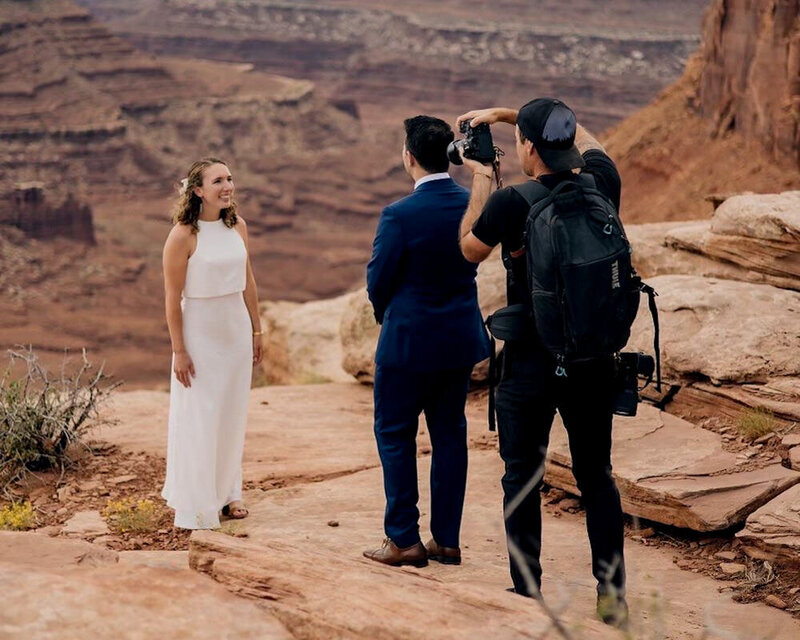 bride holding up the end of her dress