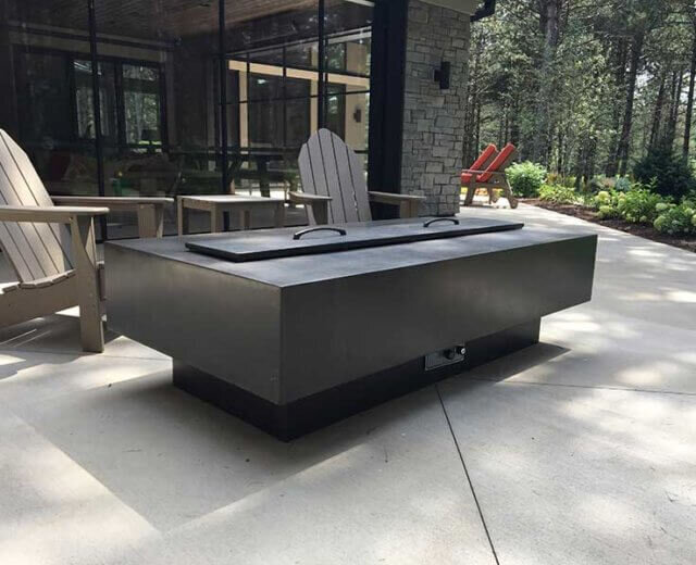 Rectangular concrete fire pit table in cast concrete with electric start