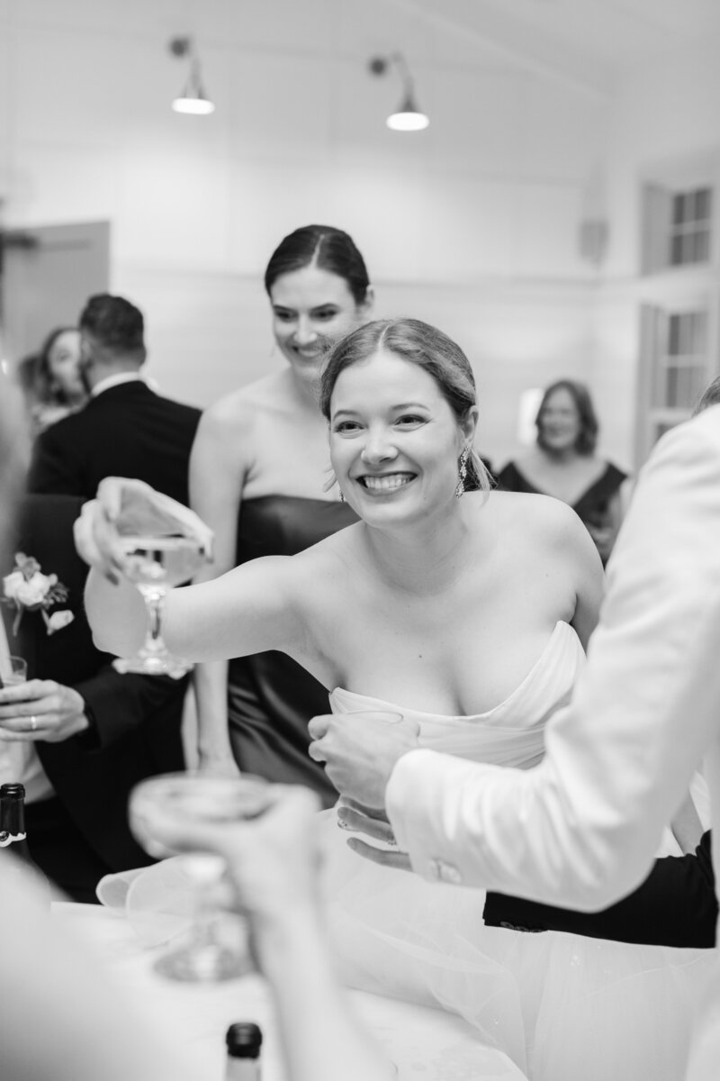 bride-cheers-champagne-reception