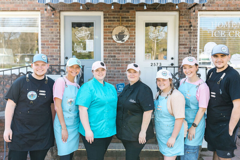 photo of southerns creamery co's staff in front of store