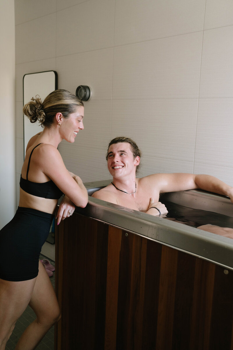 Couple enjoying sauna and contrast therapy session at Dahlia wellness center
